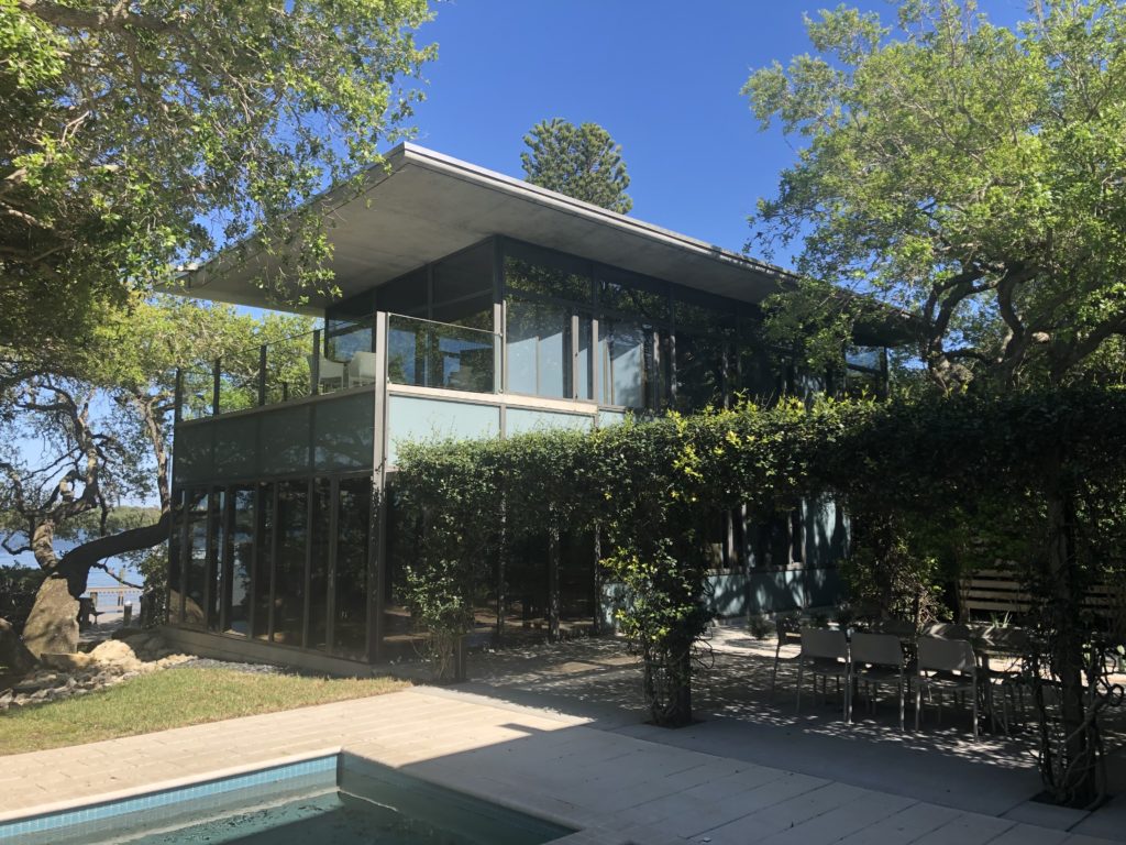 Glass-walled modern home in Sarasota cleaned by Clearview